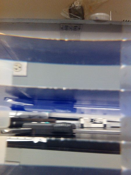 File:Desk thru aerogel.jpg